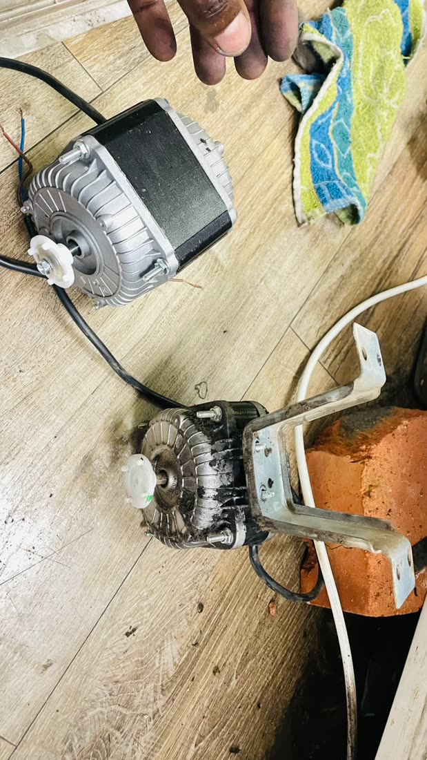 Replacement fan motors ready for fitting