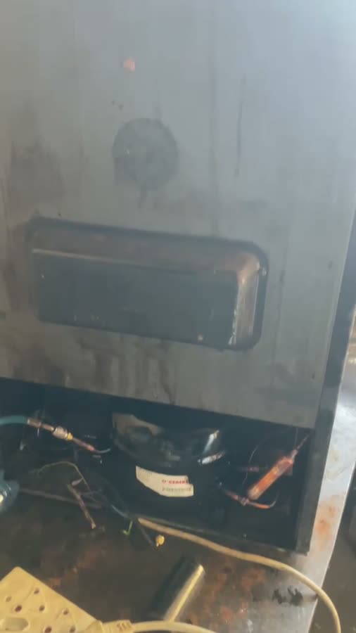Refrigeration repair footage, on site